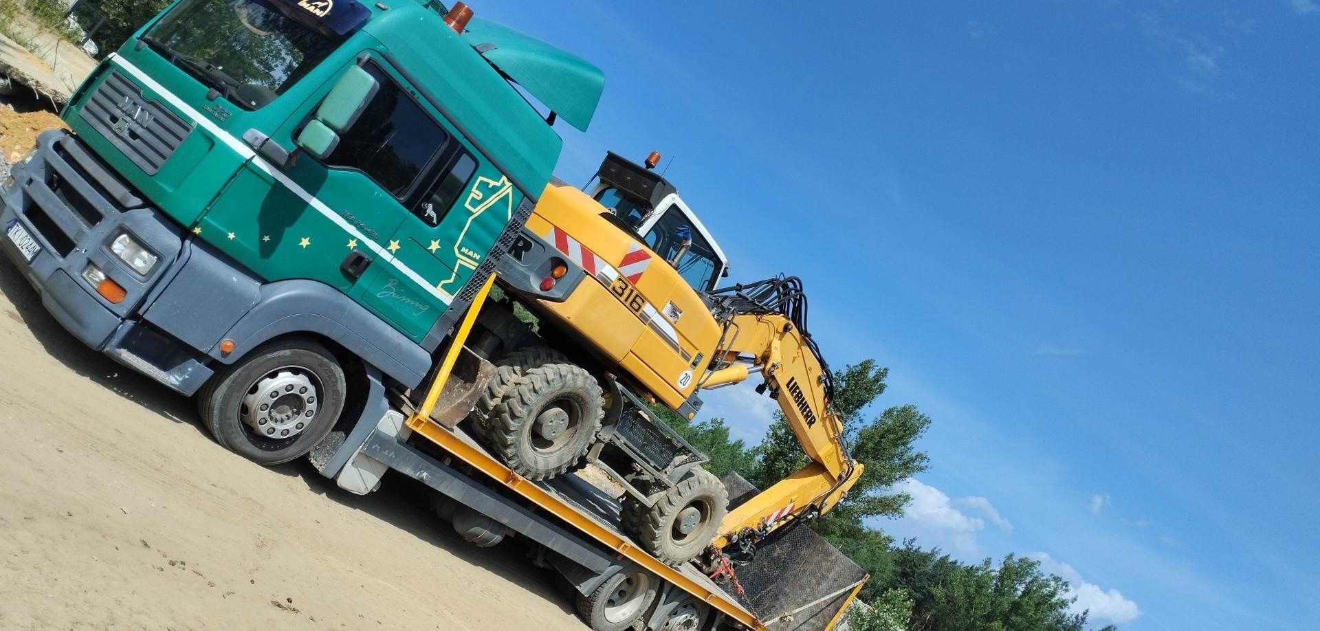 transport przewóz maszyn rolniczych budowlanych autolaweta pomoc 24h