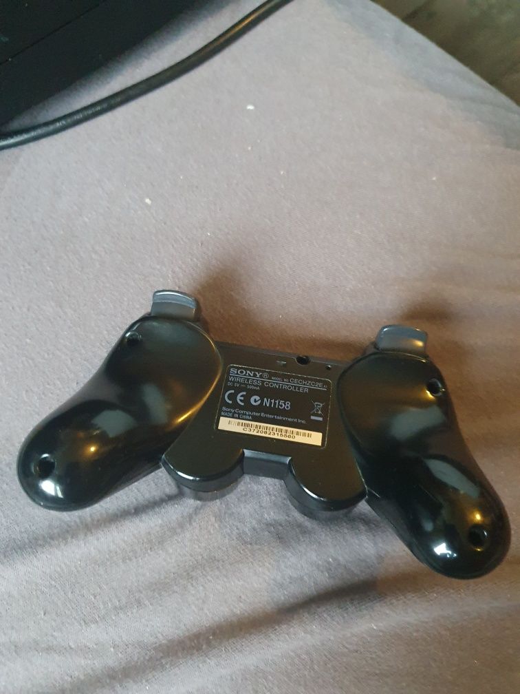 Playstation 3 slim + oryginalny pad +cztery gry