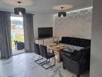 Apartament z ogrodem i parkingiem w Ustce