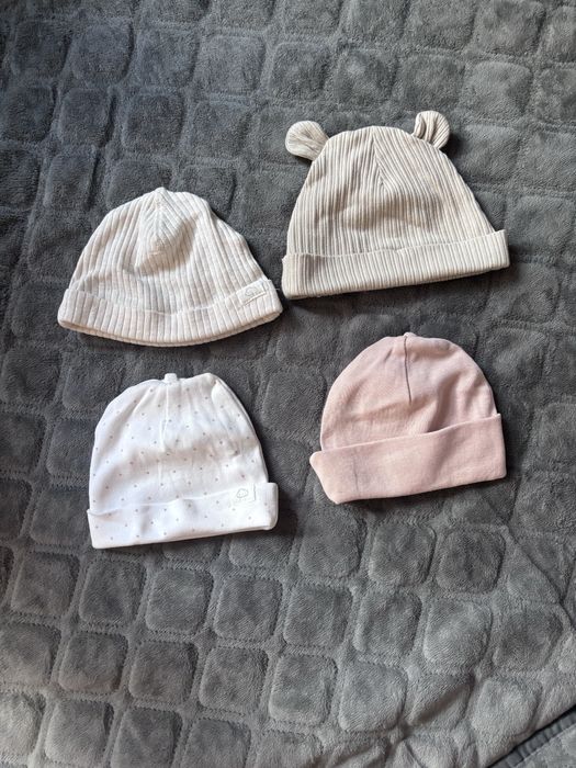 Дитячі шапочки на новонародженого