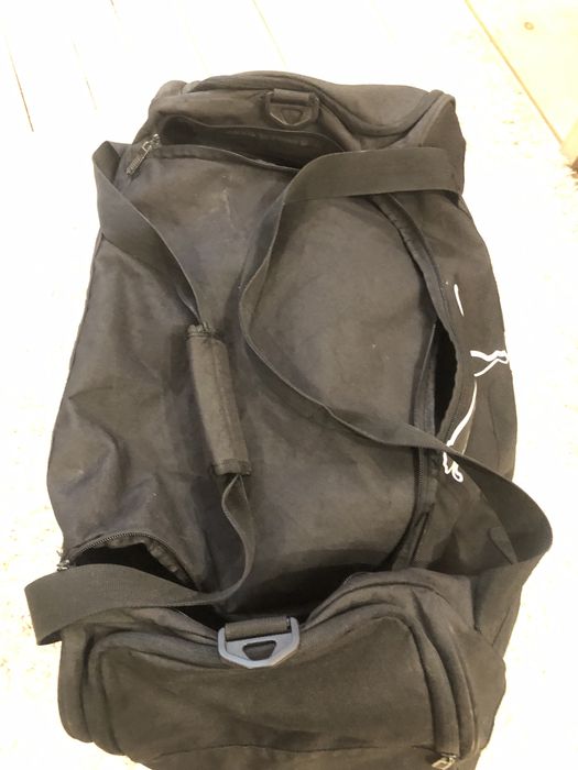 Фірмова дорожня сумка нова була лише один раз в користуванні