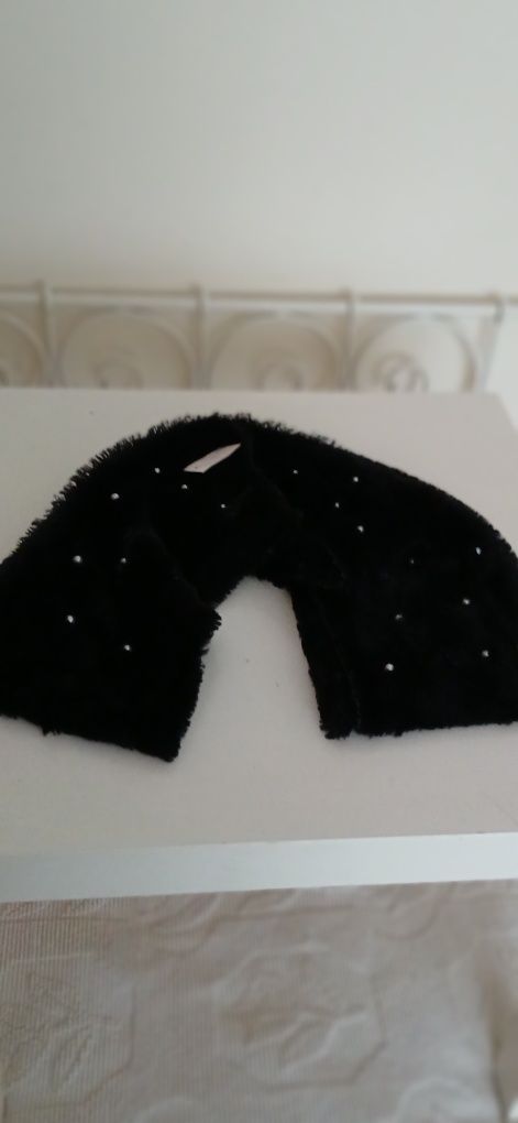 Gola com pérolas,  nova