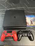 Playstation 4 slim 1Tb + 2 pady + 1 gra