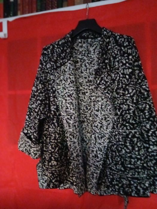 Magnifico casaco tres cuartas