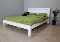 Внаявності двоспальне дерев'яне ліжко в розмірі 140/160/180*200