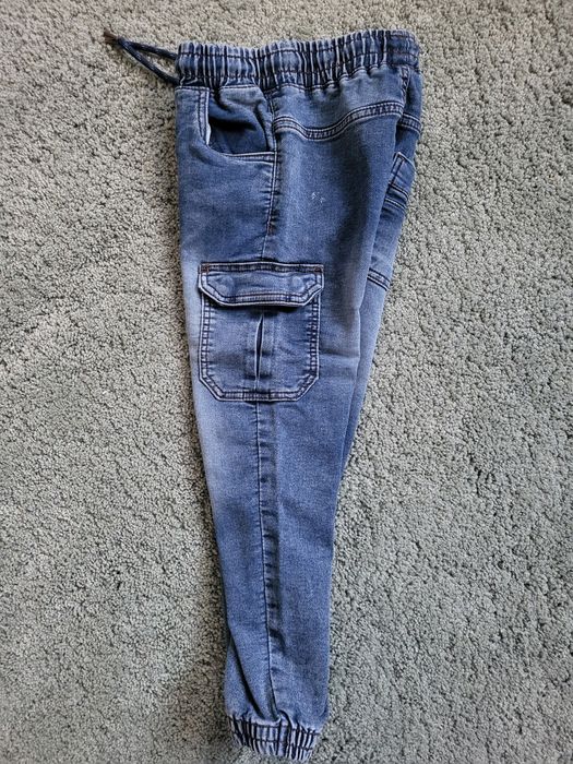Spodnie typu jogger r. 122 reserved stan idealny