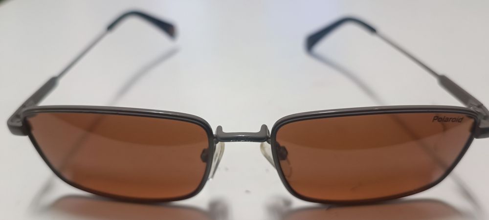 Óculos Polaroid e Web