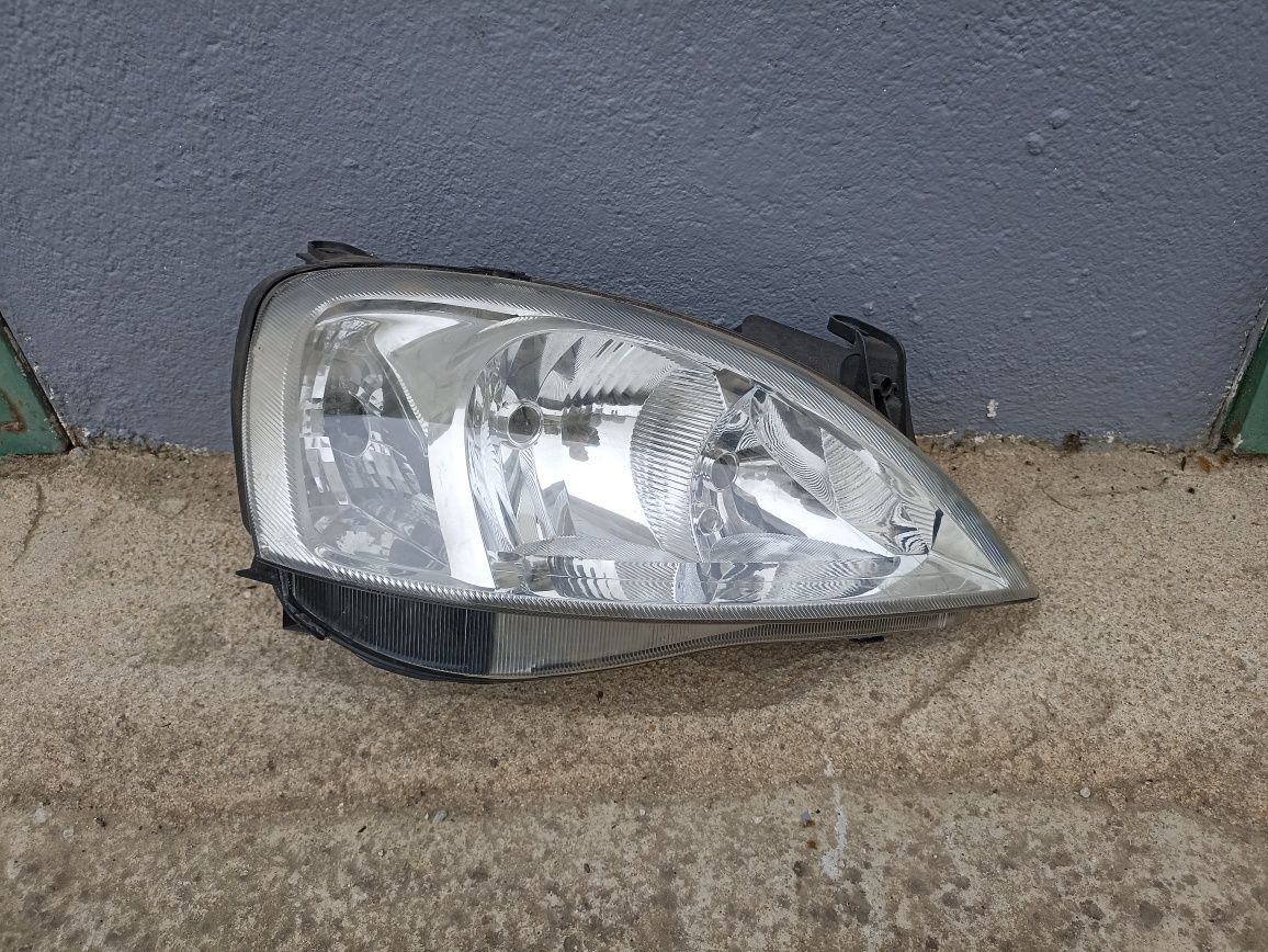 Farol direito Opel