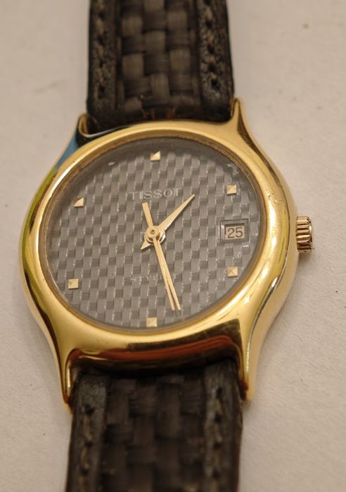 Zegarek Tissot - elegancki klasyk z oryginalnym paskiem - uszkodzony