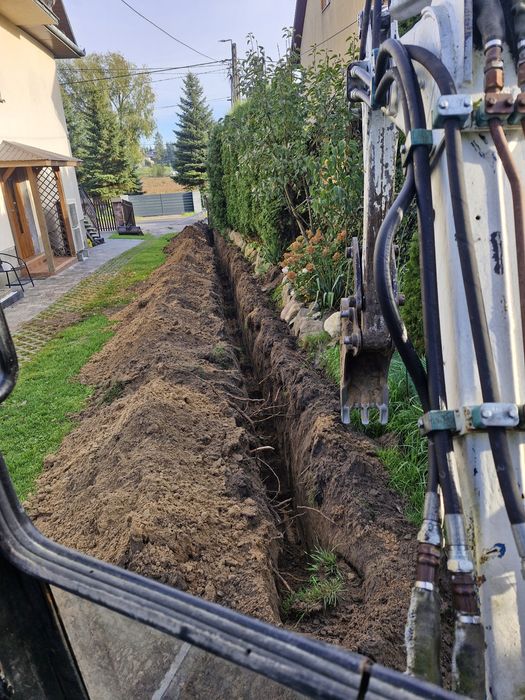 Koparko-ładowarka minikoparka wywrotka