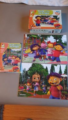 2 puzzles Sid Ciência (24 peças cada) + Livro de atividades (24 pág.)