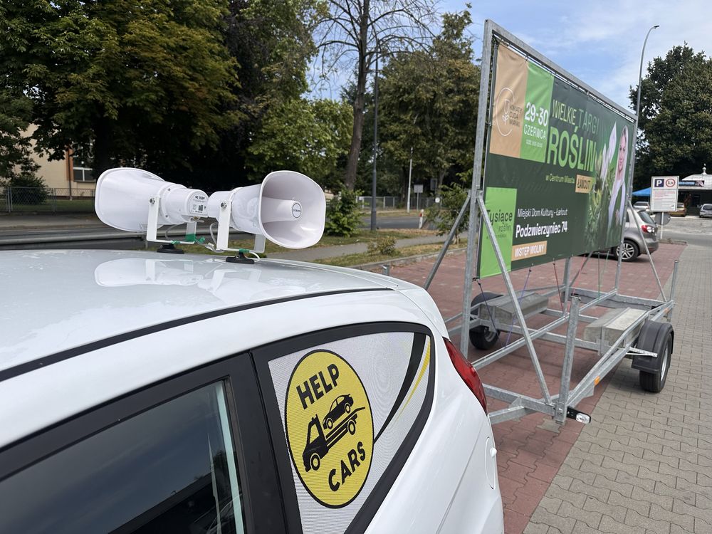 Przyczepka reklamowa wynajem reklama stacjonarna mobilna