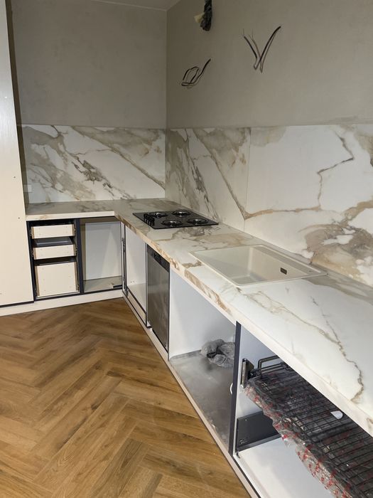 Облицювання плиткою та інші будівельні роботи