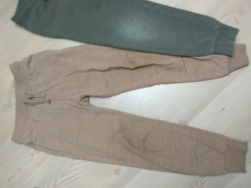 Dwie pary spodni dresowych H&M 128