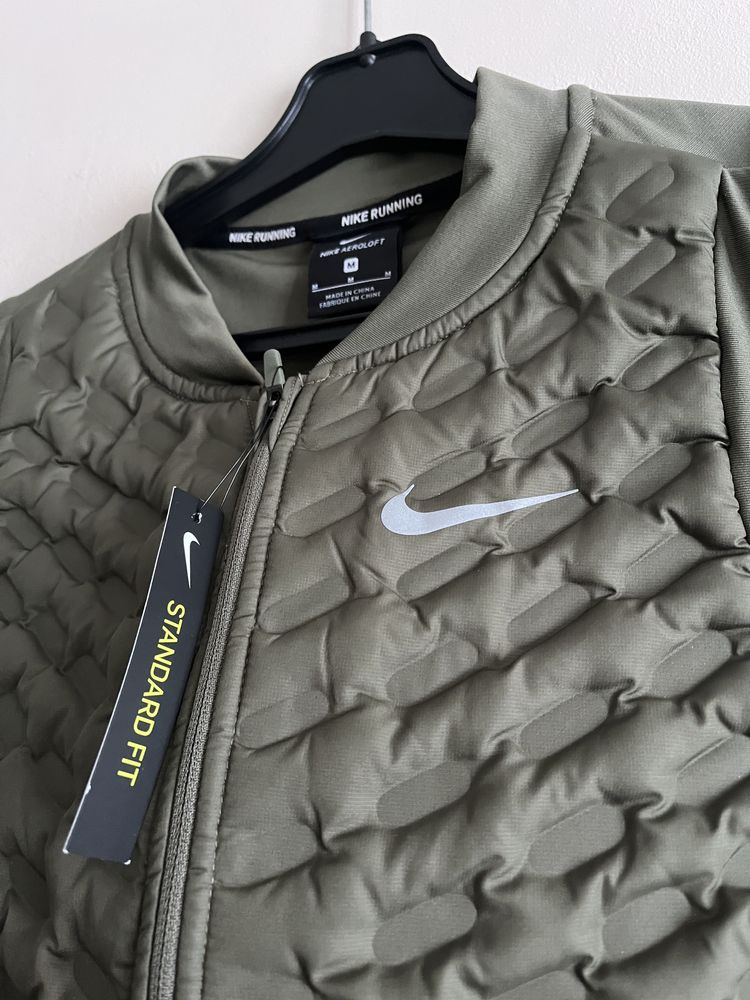 Нова Бігова спортивна жилетка nike sportwear aeroloft