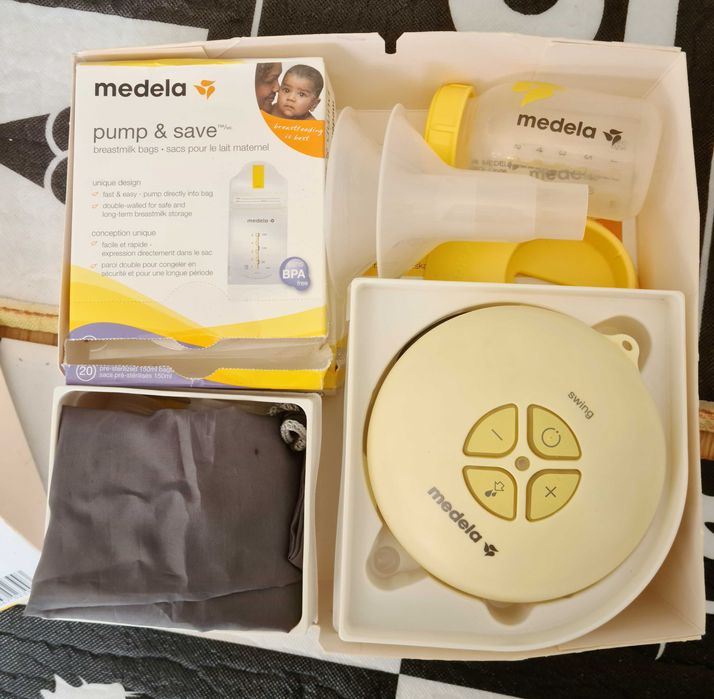 Kultowy laktator elektryczny Medela Swing + woreczki na pokarm