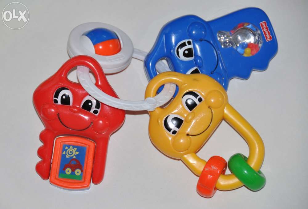 Zestaw zabawek dla niemowlaka. Grzechotka, kluczyki fisher price itd..