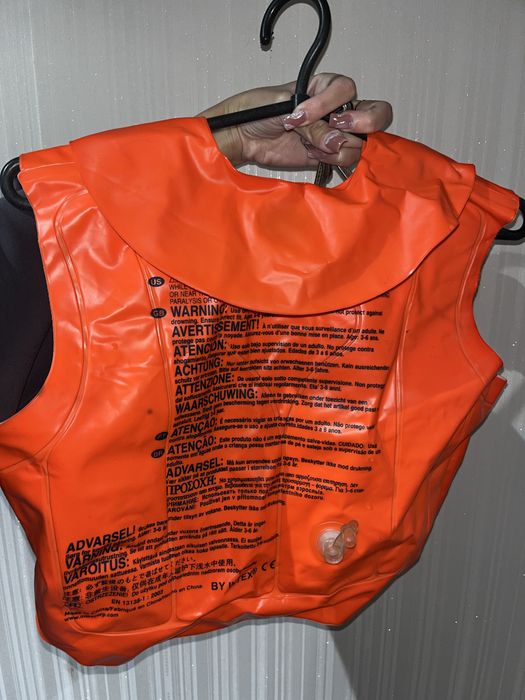 Надувной спасательный жилет