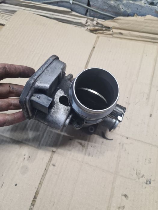 Дросільна заслонка Дросельна заслінка BMW E83 E87 E90 E91 779148103