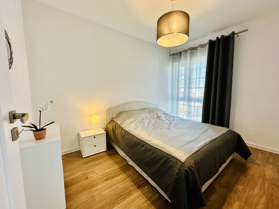 Komfortowy apartament z prywatnym miejscem postojowym (3 pokoje)