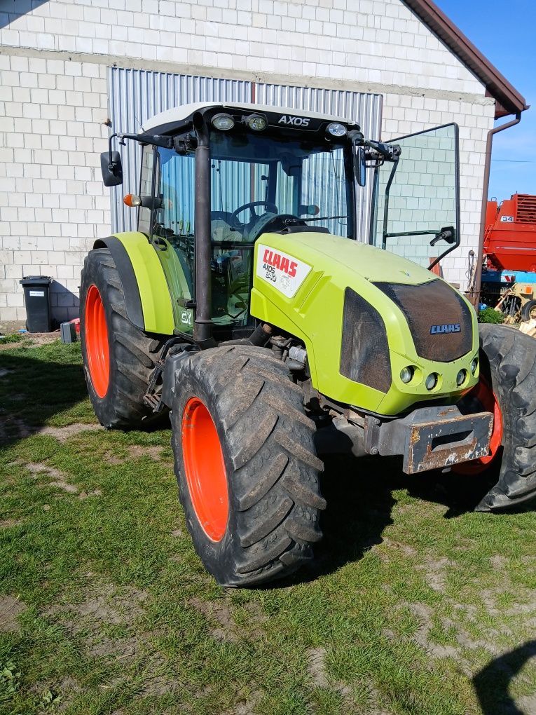 CLAAS Axos 340 cx Tur mx 100, 2009r łyżko krokodyl . 330