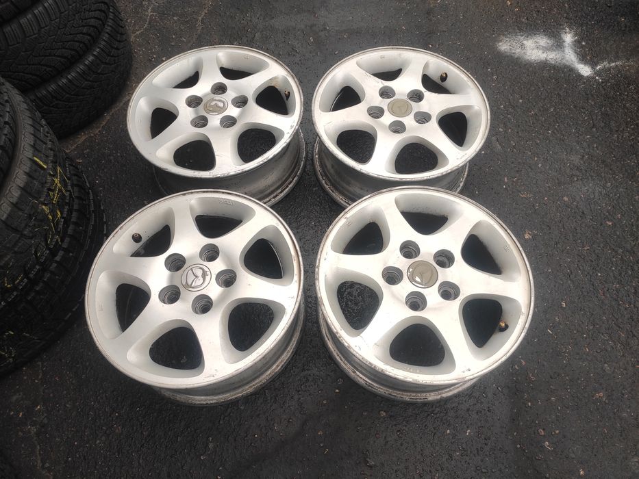 Диски 5х114.3 15 6х15 ет50.Mazda.ц.о.67.1мм.оригинал.Enkei.