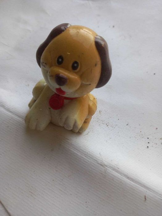 Figura decorativa em forma de cãozinho