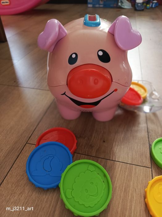 Świnka skarbonka Fischer Price