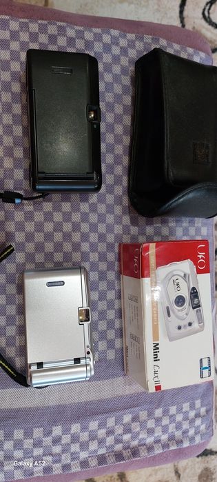 Фотоаппарат плёночный Minolta AF101R и UFO