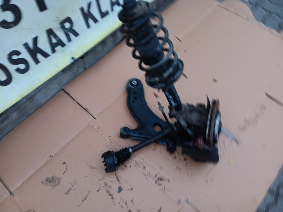 VW Golf IV 1.4 1.6 mcpherson wahacz półoś zwrotnica lewa lewy przód