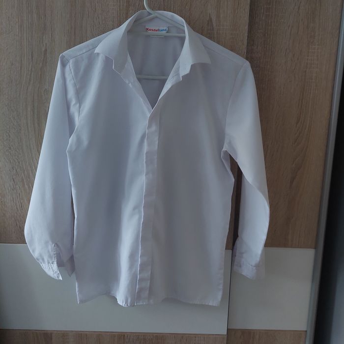 Biała koszula r. 152