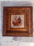 Quadro com moldura antiga em madeira dourada e azulejo