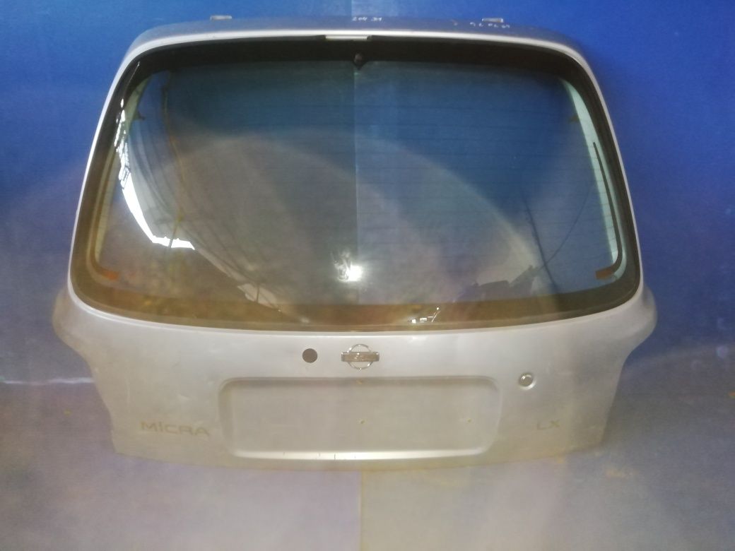 Tampa da mala para Nissan micra 1999