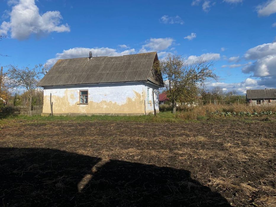 Продам земельну ділянку з будинком