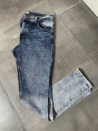 Męskie spodnie jeans 44