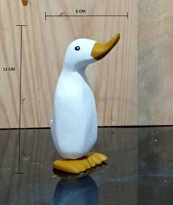 Conjunto de patos de madeira.