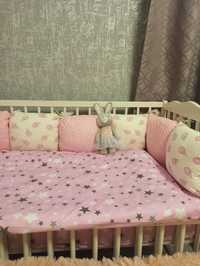 Бортики, подушки в дитяче ліжечко