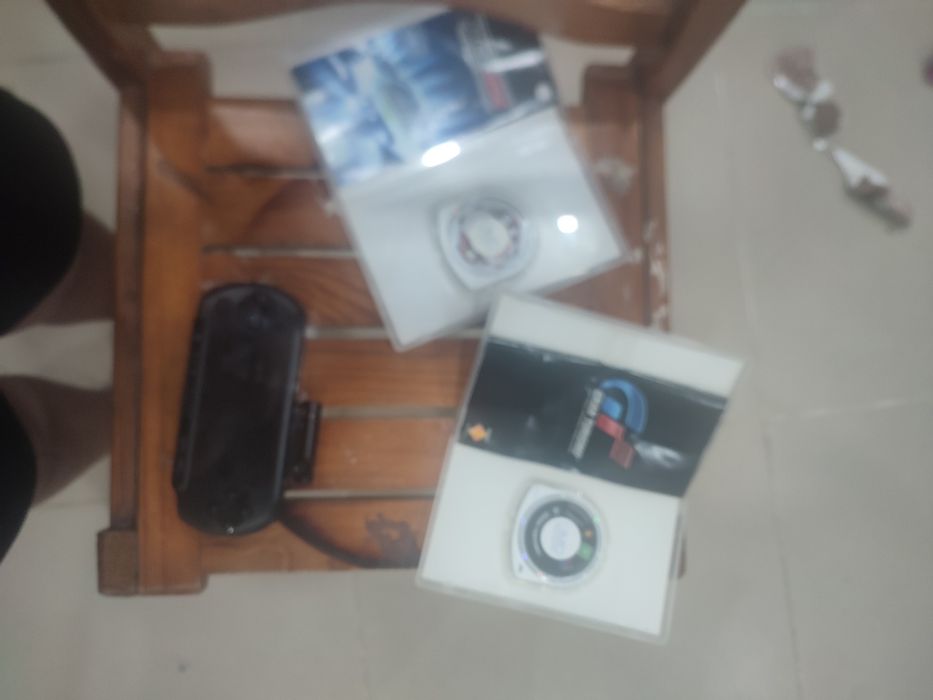 Psp usada com 2 jogos 100% funcional