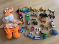 Пакет игрушек 24 шт : кукла,зверюшки,рюкзак,попыт и др.