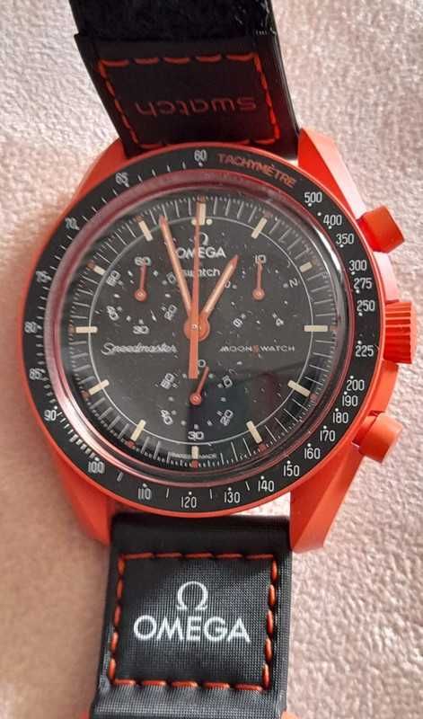 Omega Swatch SO33O100 Lava Archiwum Ziemi
