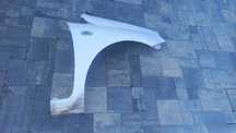 Fiat Punto grande blotnik przedni prawy bialy 249