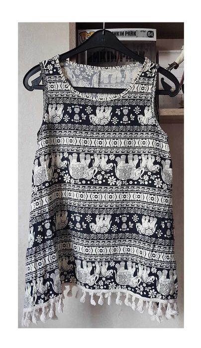 Bluzka na ramiączkach w słonie unika