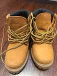 Botas pele tamanho 32 como novas