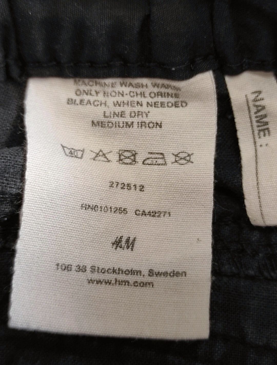 Krótkie spodenki bermudy czarne  dłuższe H&M 110