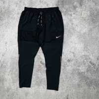 Спортивні - бігові штани Nike Running