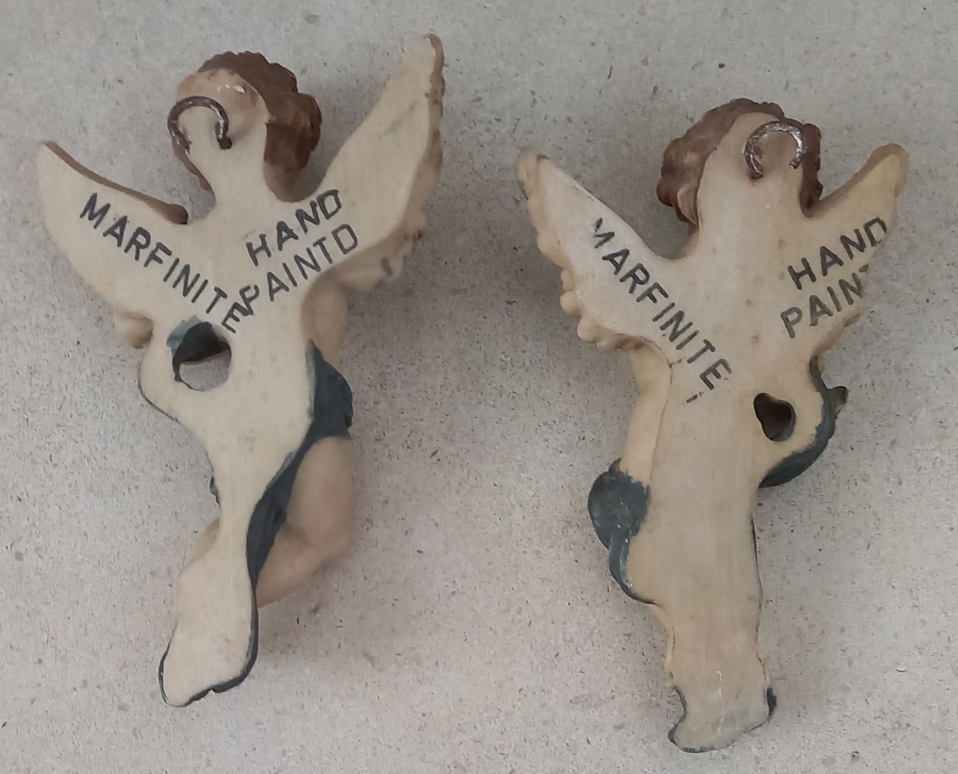 Conjunto de anjos em Marfinite
