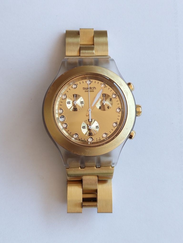 Vendo relógio dourado Swatch
