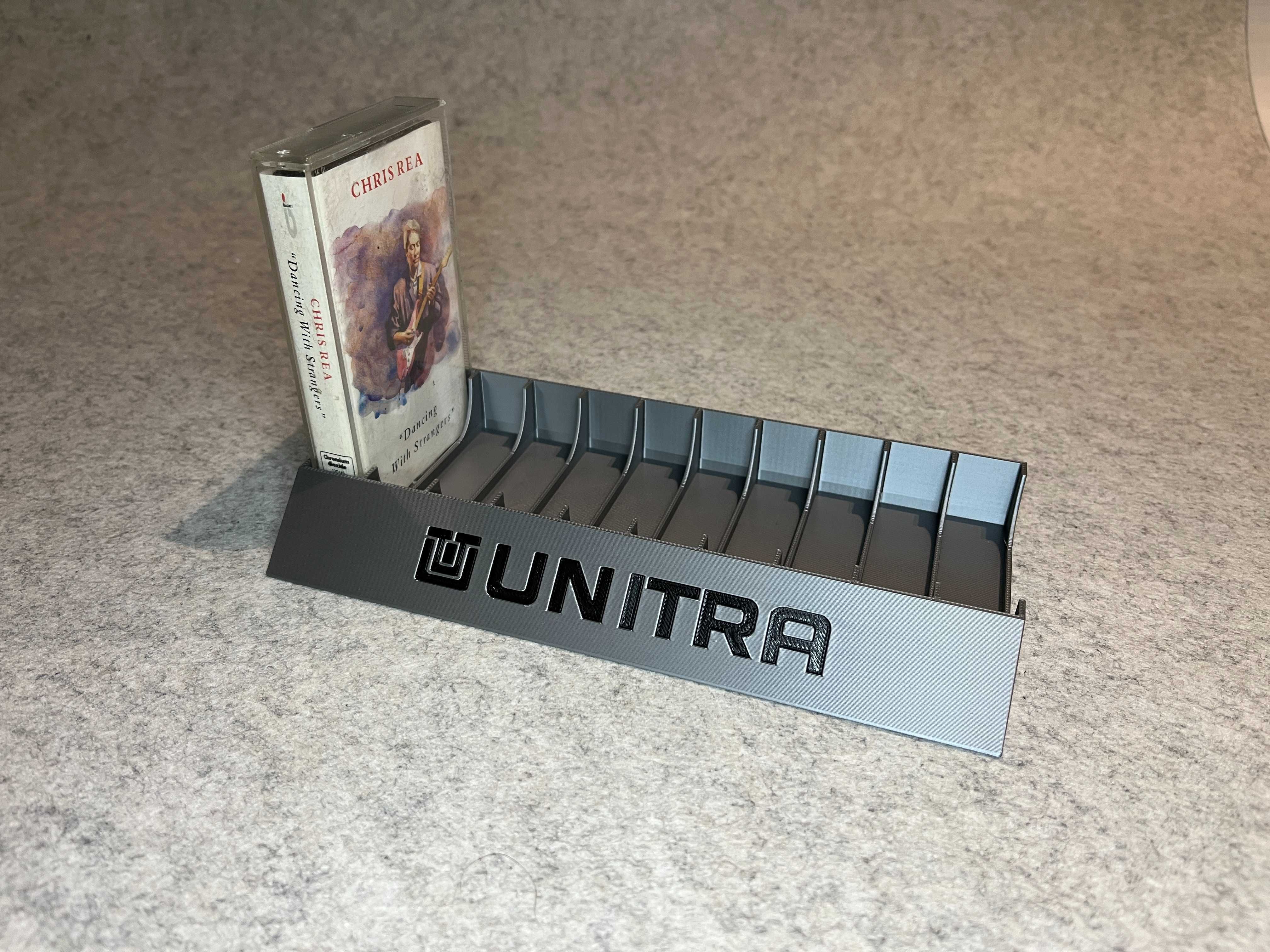 Stojak podstawka na 10 kaset magnetofonowych Unitra srebrna