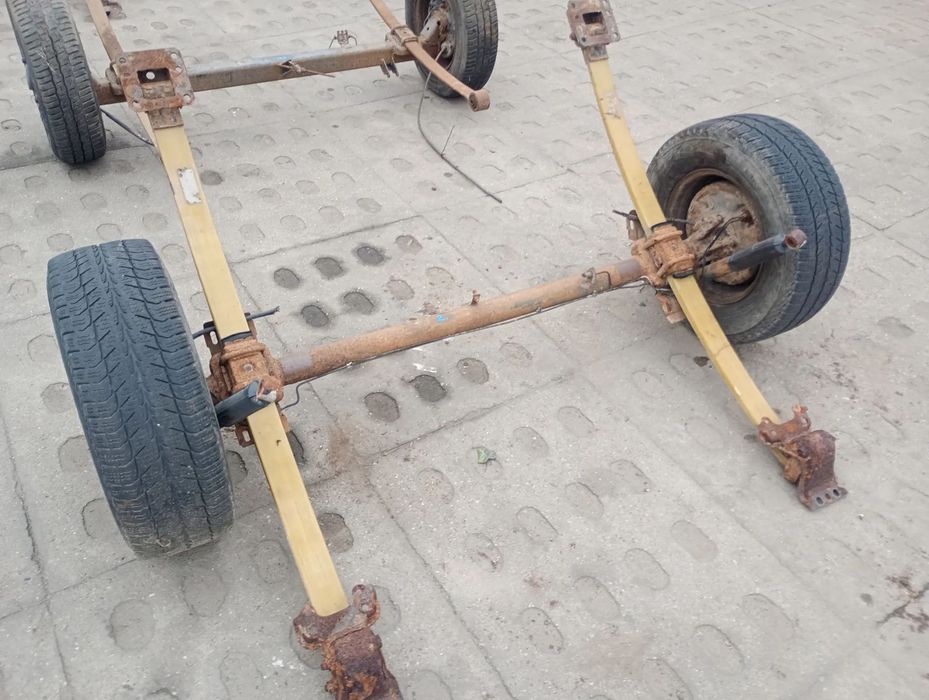 Belka tylna zwieszenia z kołami resorami na przyczepkę wózek jednoosiówka SAM z BUSA