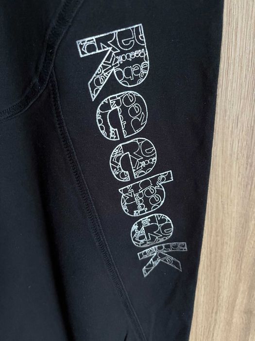Spodnie dresowe damskie czarne Reebok modelujące bawełna 100 %
